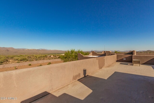 view of patio with a mountain view