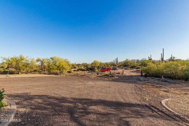 view of yard with a rural view