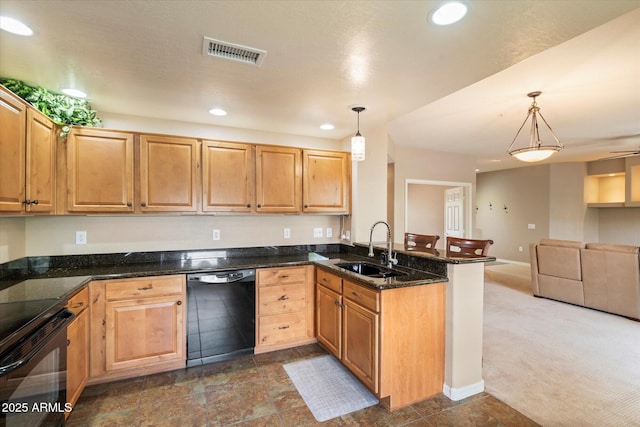 kitchen with visible vents, a peninsula, a sink, black appliances, and open floor plan