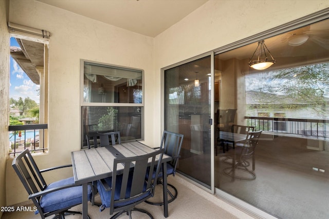 balcony with outdoor dining area