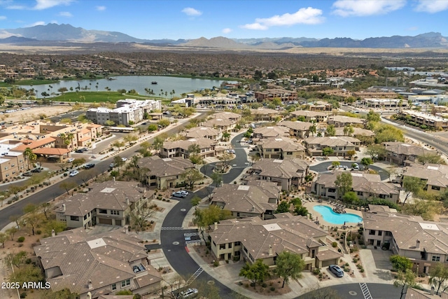 bird's eye view featuring a residential view and a water and mountain view