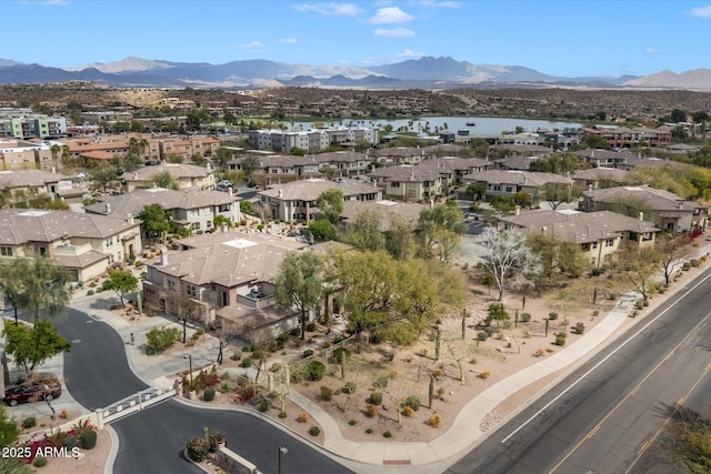 aerial view with a residential view and a water and mountain view