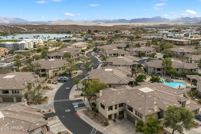 aerial view with a water and mountain view