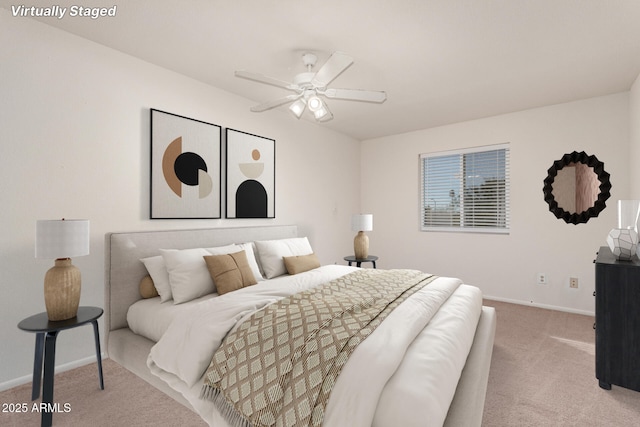 carpeted bedroom featuring baseboards