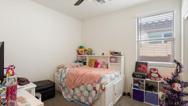 carpeted bedroom featuring visible vents and ceiling fan