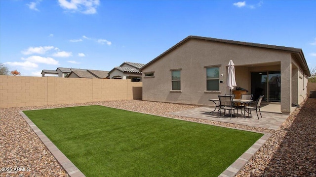 exterior space featuring a patio and a fenced backyard