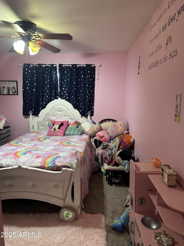 bedroom featuring carpet and ceiling fan