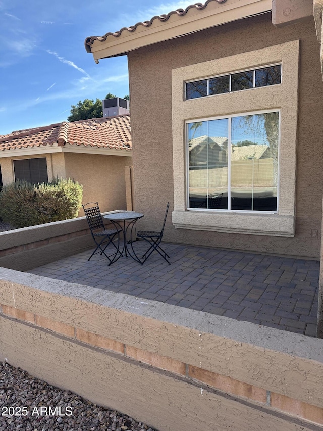 view of patio featuring central AC unit