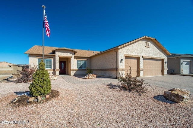 single story home featuring a garage