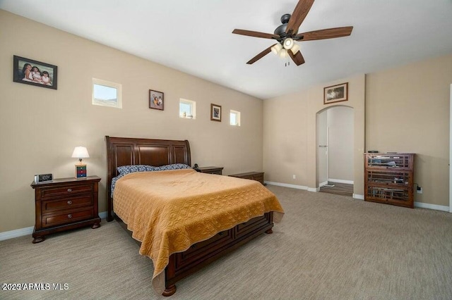 bedroom featuring light carpet and ceiling fan