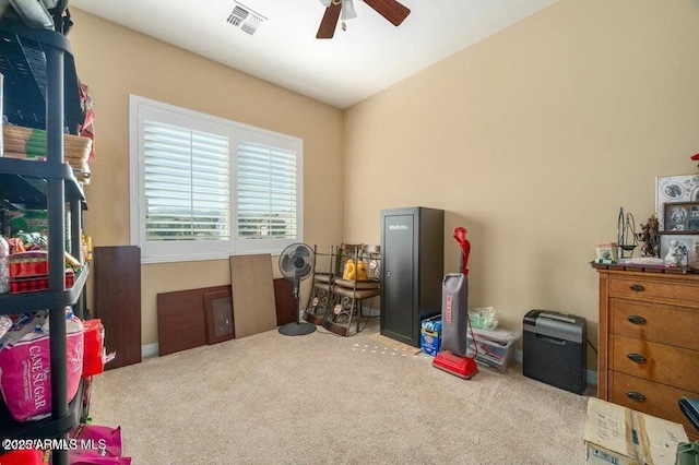 miscellaneous room featuring ceiling fan and carpet