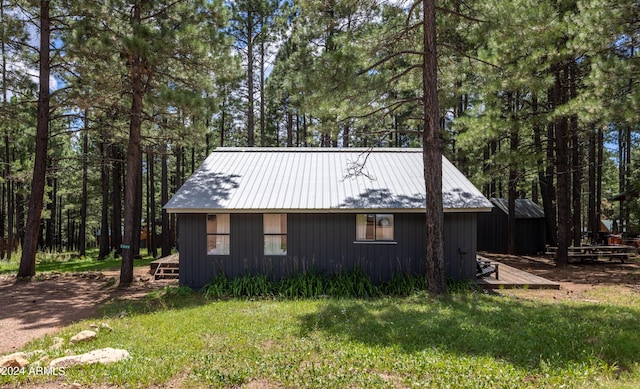 view of home's exterior featuring metal roof