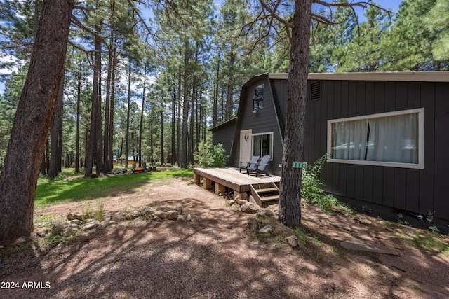 view of yard with a wooden deck