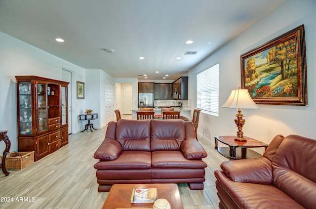 living room with light hardwood / wood-style floors