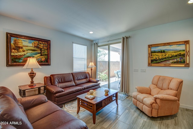 living room with light hardwood / wood-style flooring