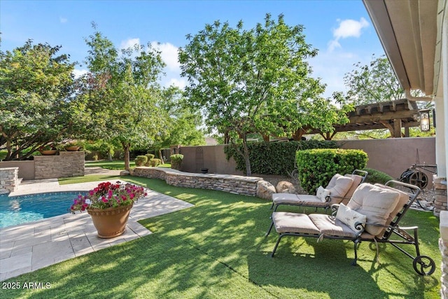 view of yard featuring fence and a patio