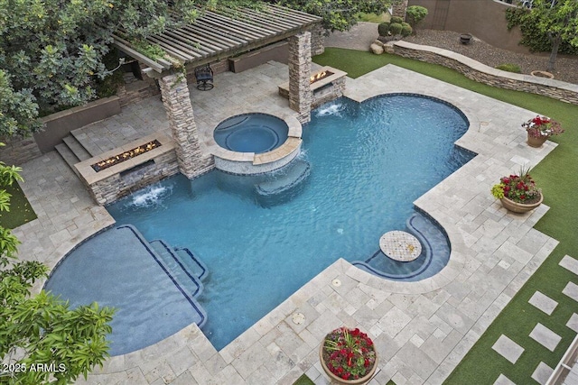 view of swimming pool with a pergola, a pool with connected hot tub, and a patio area