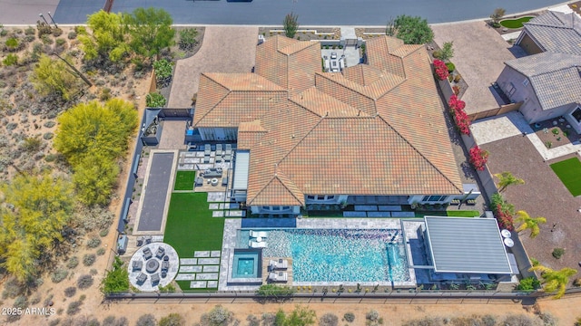 view of subject property featuring a pool