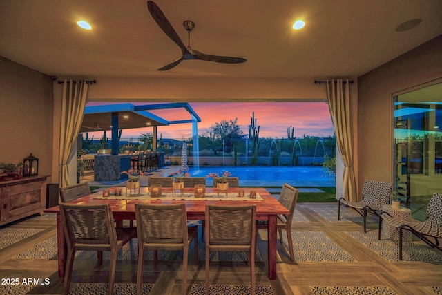 dining area with ceiling fan and recessed lighting