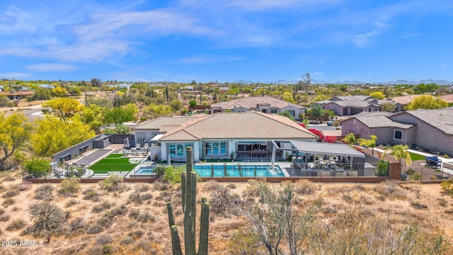outdoor pool with a residential view