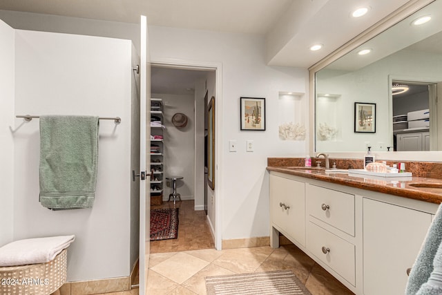 bathroom featuring vanity and tile patterned floors