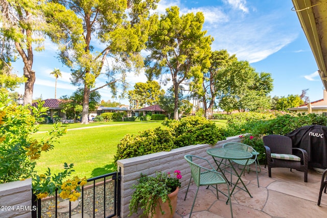 view of patio with a grill