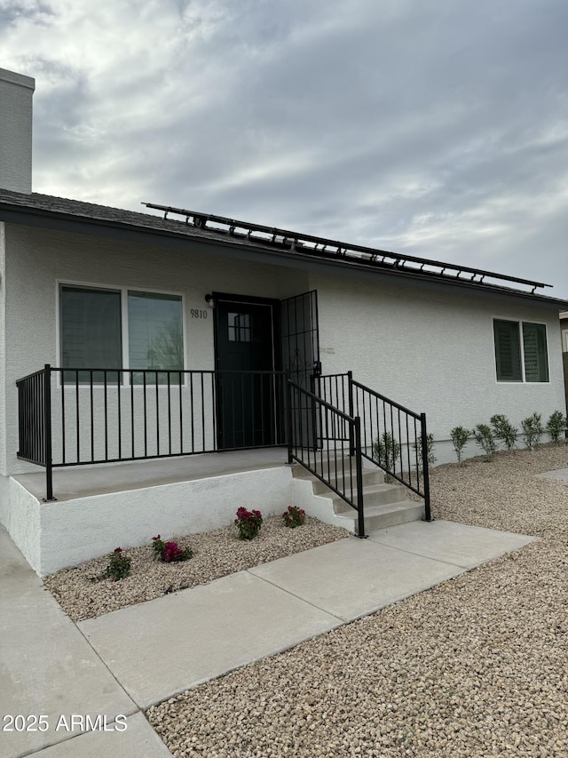 view of front of home featuring stucco siding