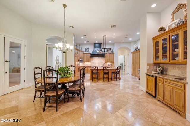 dining room featuring an inviting chandelier