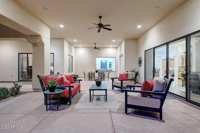 view of patio featuring outdoor lounge area and ceiling fan