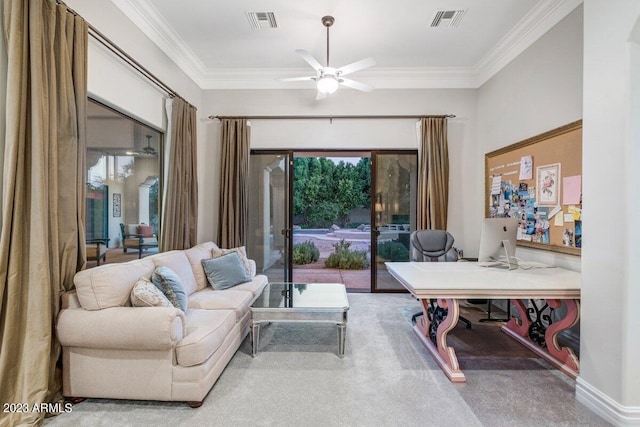 carpeted office featuring crown molding and ceiling fan