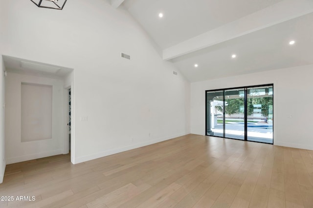 unfurnished room featuring baseboards, visible vents, beamed ceiling, light wood-style floors, and high vaulted ceiling