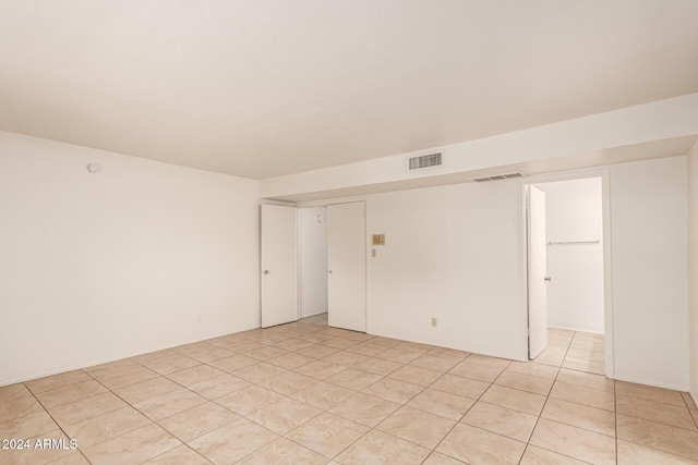 8027 N 32nd Ave, Phoenix, AZ 85051 - empty room featuring light tile patterned flooring