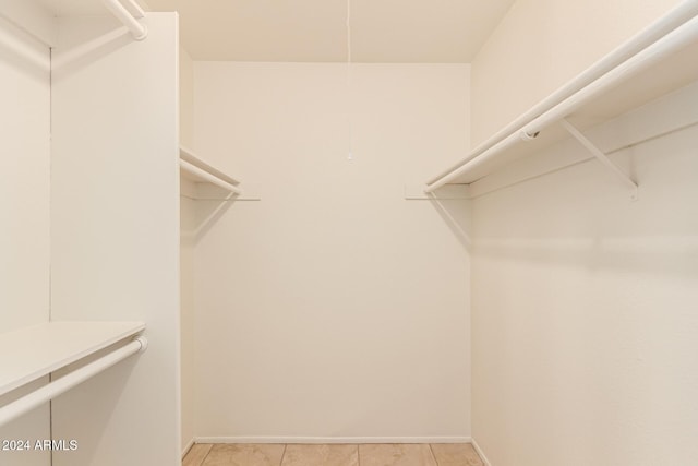 8027 N 32nd Ave, Phoenix, AZ 85051 - spacious closet with light tile patterned flooring