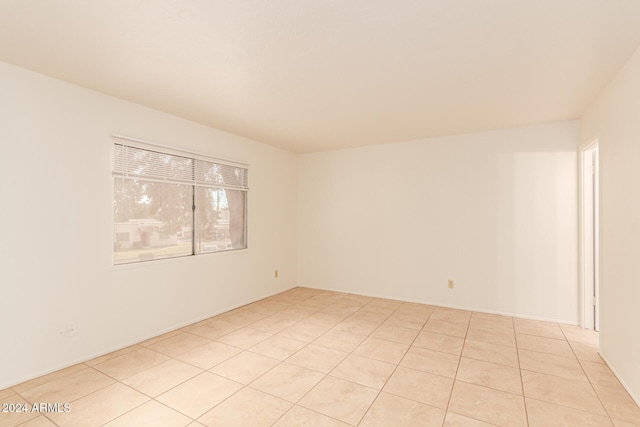 8027 N 32nd Ave, Phoenix, AZ 85051 - empty room with light tile patterned floors