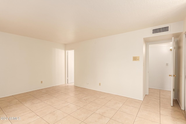 8027 N 32nd Ave, Phoenix, AZ 85051 - spare room featuring light tile patterned floors