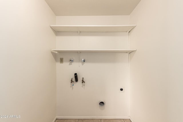 8027 N 32nd Ave, Phoenix, AZ 85051 - laundry area with hookup for an electric dryer, gas dryer hookup, tile patterned flooring, baseboards, and washer hookup