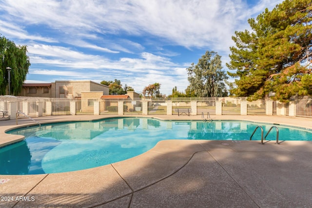 8027 N 32nd Ave, Phoenix, AZ 85051 - community pool with a patio area