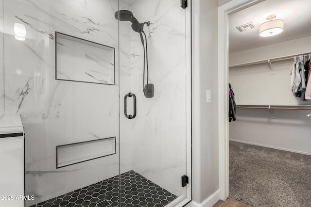 bathroom featuring walk in shower