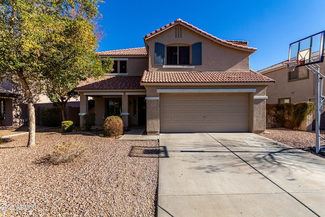 mediterranean / spanish-style house featuring a garage