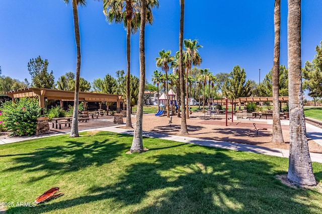 view of jungle gym with a lawn