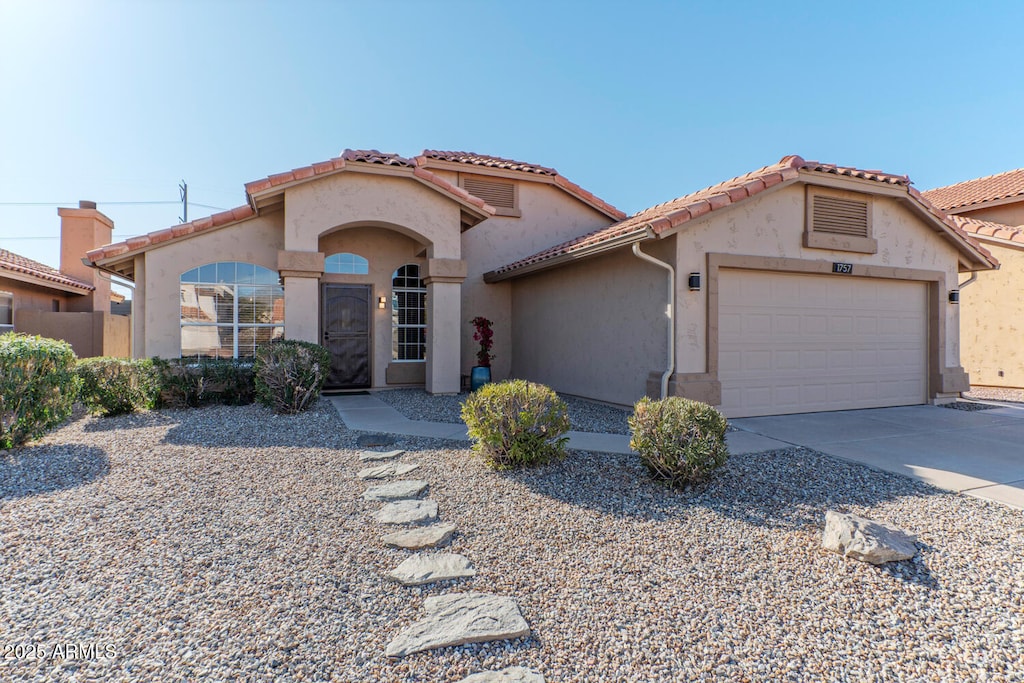 view of front of property with a garage