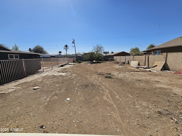 view of yard featuring fence