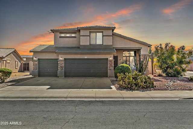 view of front of property with a garage