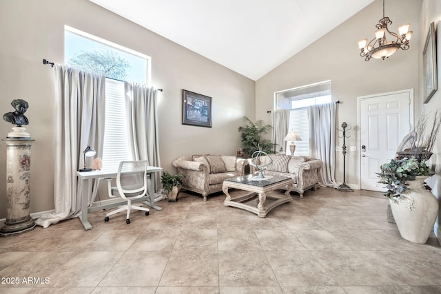 tiled living room featuring an inviting chandelier and high vaulted ceiling