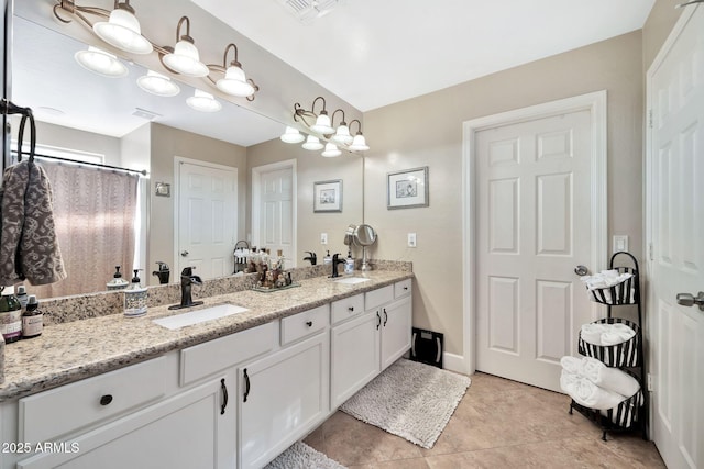 bathroom featuring vanity and tile patterned floors