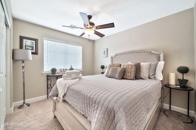 bedroom with ceiling fan and carpet flooring