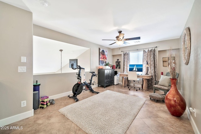 exercise area with ceiling fan