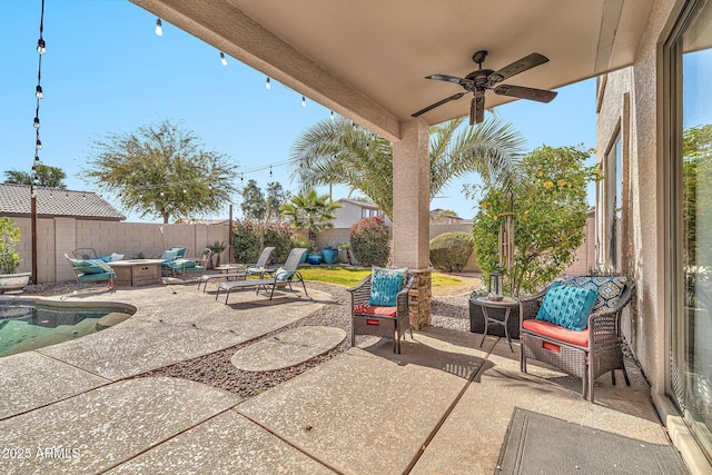 view of patio / terrace featuring ceiling fan