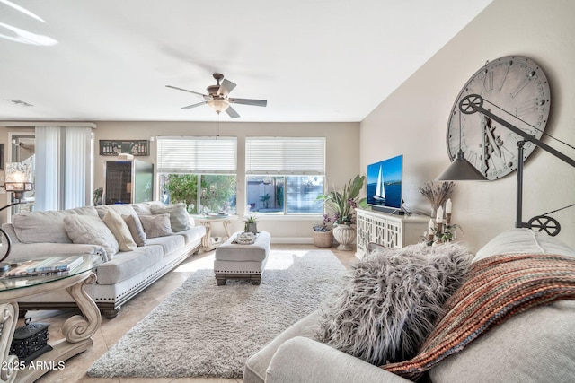 living room featuring ceiling fan