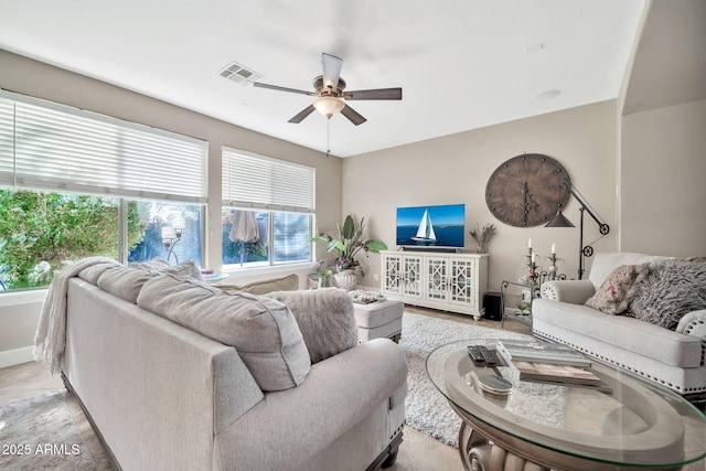 living room featuring ceiling fan